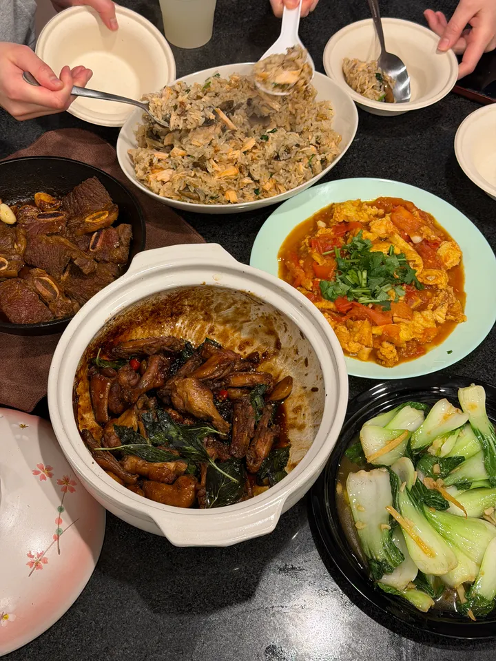 A table of dishes Will cooked for friends